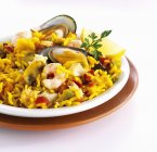 Paella rice dish with mussels — Stock Photo