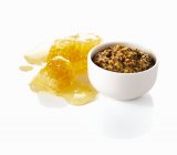 Mustard and honey comb — Stock Photo