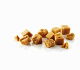 Closeup view of Fudge pieces on white surface — Stock Photo
