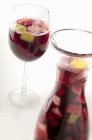 Glass and Pitcher of Sangria — Stock Photo