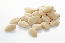 Heap of peeled almonds — Stock Photo