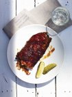 Spare ribs with gherkins — Stock Photo