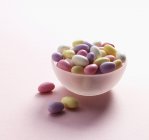 Closeup view of pastel colored sugared almonds — Stock Photo