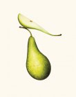 Whole pear and slice of pear — Stock Photo