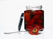 Jar of dried tomatoes in oil — Stock Photo