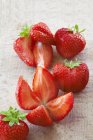 Fresh halved strawberries — Stock Photo