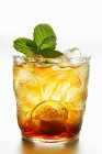 Iced tea with fresh mint in glass — Stock Photo