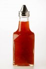 Chili sauce in bottle — Stock Photo