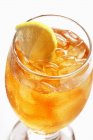 Glass of iced tea with lemon — Stock Photo