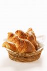 Croissants in bread basket — Stock Photo