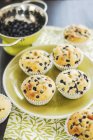 Muffins on plate with blackberries — Stock Photo