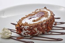 Closeup view of creamy chocolate Roulade — Stock Photo