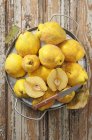 Fresh ripe Quinces in pan — Stock Photo