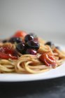 Spaghetti with steamed fruits — Stock Photo