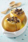 Gratinated persimmon in bowl — Stock Photo