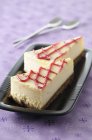 Cheesecake with raspberry lattice — Stock Photo