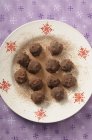 Chocolate truffles with powder — Stock Photo