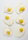 Six fried eggs — Stock Photo