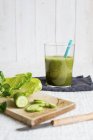 Glass of ginger and cucumber smoothie — Stock Photo