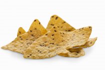 Multi-grain tortilla chips with flaxseeds — Stock Photo