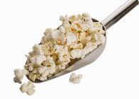 Metal scoop of popcorn — Stock Photo