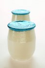 Two jars of yoghurt — Stock Photo