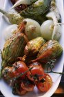 Antipasti platter of marinated vegetables on white plate — Stock Photo