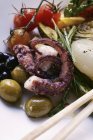 Antipasti platter of marinated vegetables and octopus — Stock Photo