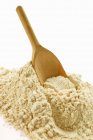 Wholemeal flour with scoop — Stock Photo
