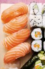 Assorted sushi on board — Stock Photo