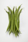 Fresh green beans with drops of water — Stock Photo