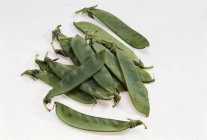 Fresh sweet peas in pods — Stock Photo