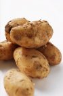 Several raw and fresh potatoes — Stock Photo
