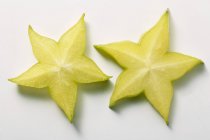Two slices of carambola — Stock Photo