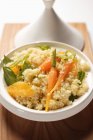 Couscous with carrots and oranges — Stock Photo