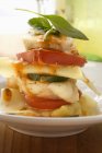 Monkfish lasagne with tomatoes — Stock Photo