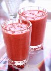 Two strawberry smoothies — Stock Photo