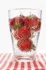 Glass of sparkling strawberry punch — Stock Photo