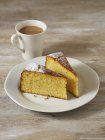 Orange cake and cup of coffee — Stock Photo