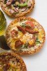 Tre diverse mini-pizze — Foto stock