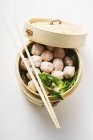Shrimp balls in bamboo steamer — Stock Photo