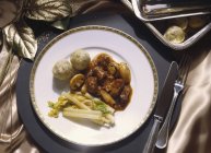 Festive Stew on white plate — Stock Photo