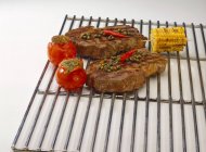 Grilled Pork Cutlets with tomatoes and corn — Stock Photo