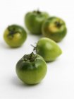 Cinque pomodori verdi — Foto stock