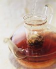 Fruit tea in  pot — Stock Photo