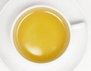 Taza de té de manzanilla - foto de stock