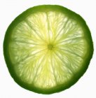 Slice of ripe lime — Stock Photo