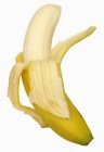 Banana matura sbucciata a metà — Foto stock