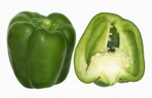 Green pepper with half — Stock Photo