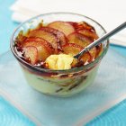 Cream dessert with plums — Stock Photo